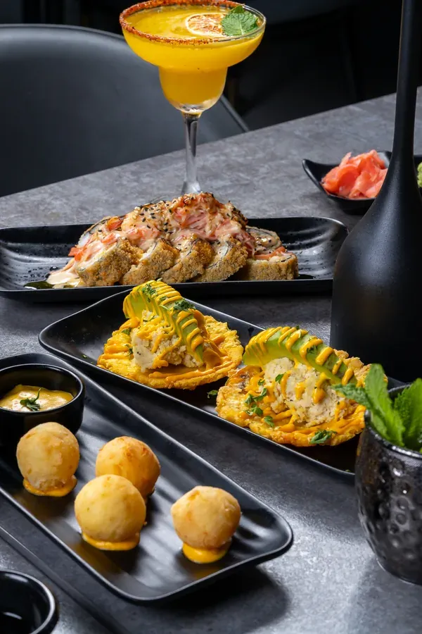 A table of KamiKoi dishes and cocktails
