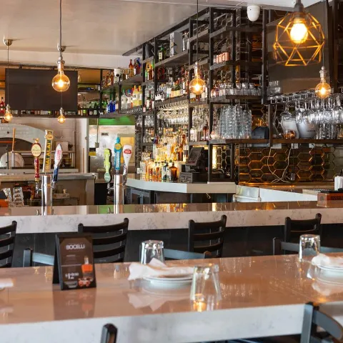 Tables, chairs, and the serving counter.