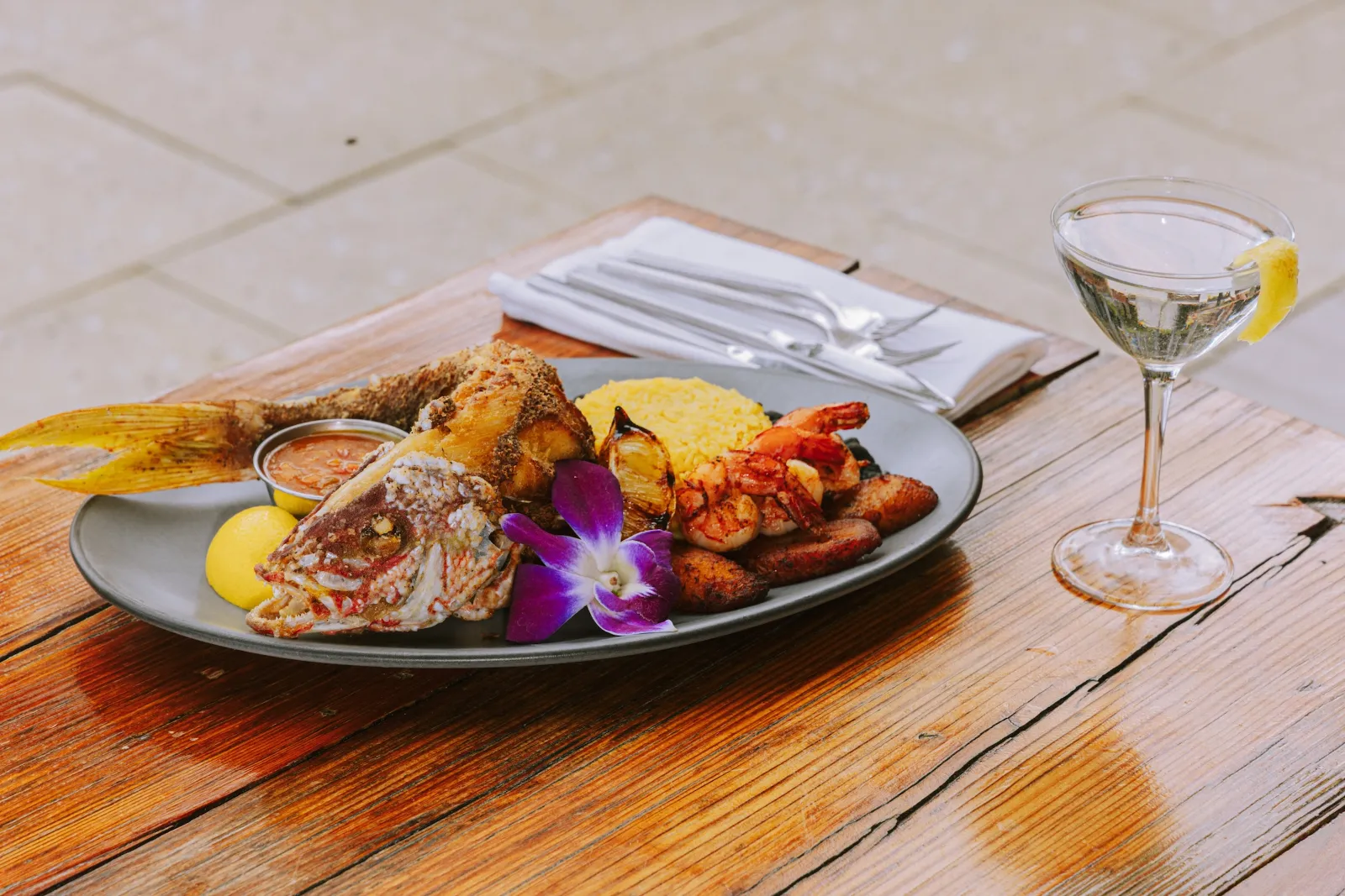 seafood dish with accompanying cocktail