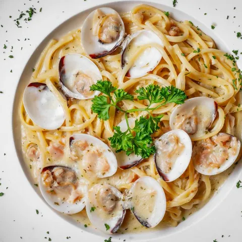 Linguine with clams in white wine sauce.