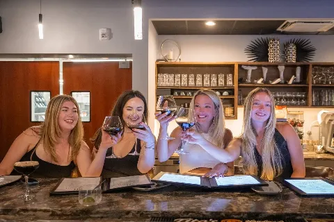 Girls Night Out done right! ✨Wine glasses up. Girls&rsquo; Night Out is better at the bar at 844 Gulf &amp; Prime.🍷