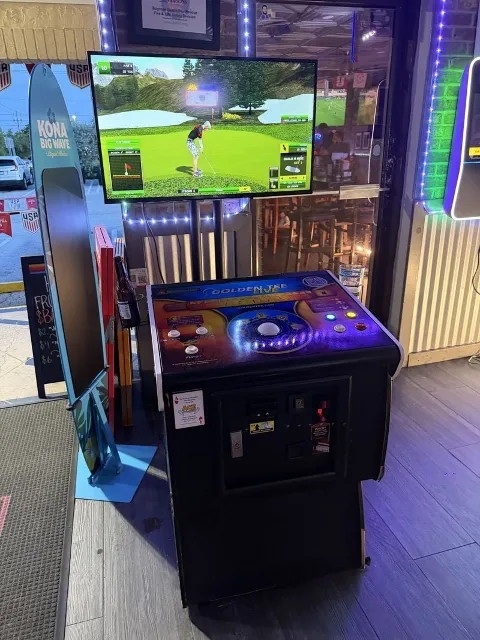 Golden Tee golf arcade game at The Boulevard Bar & Grill