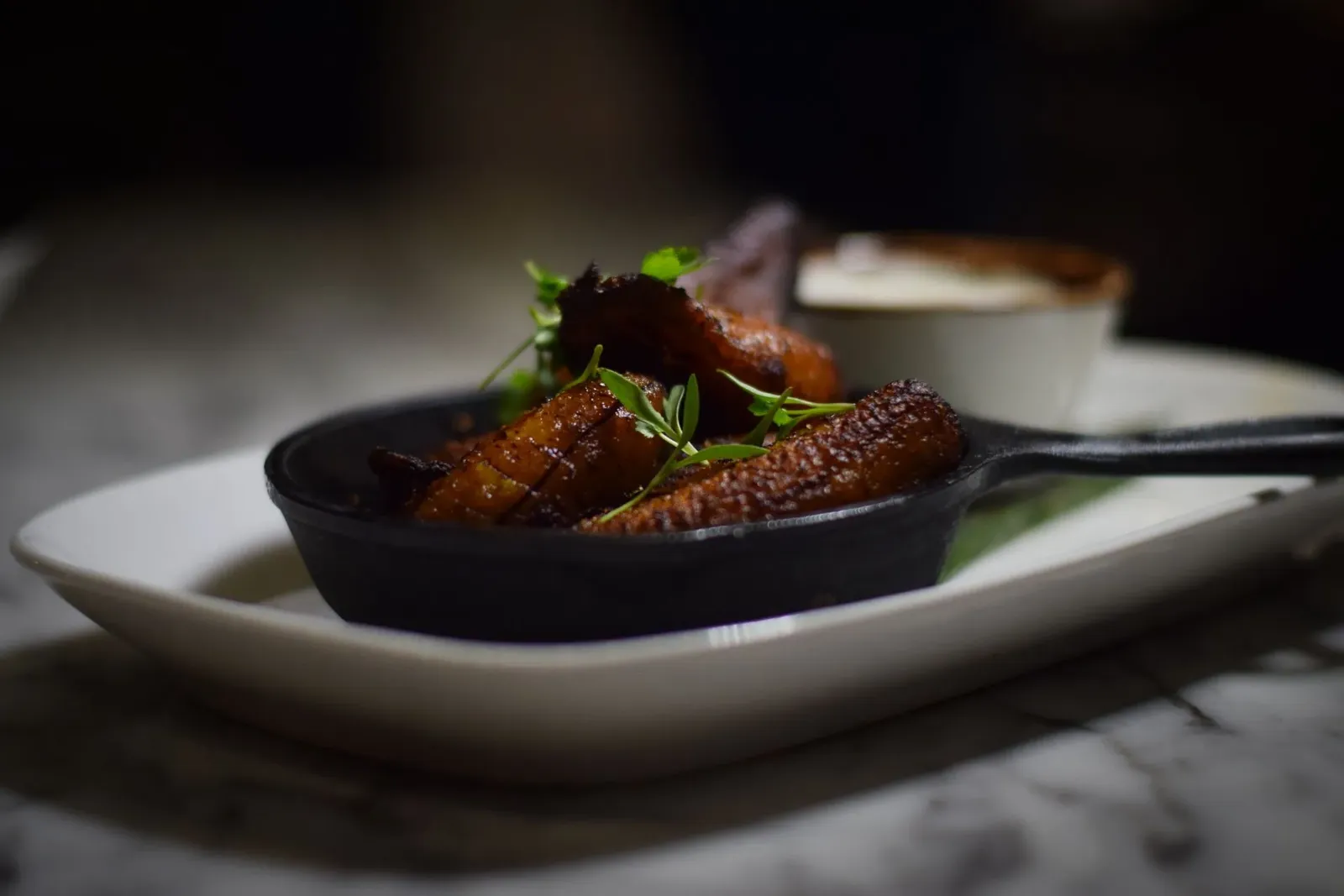 A close up of a plate of food on a table.