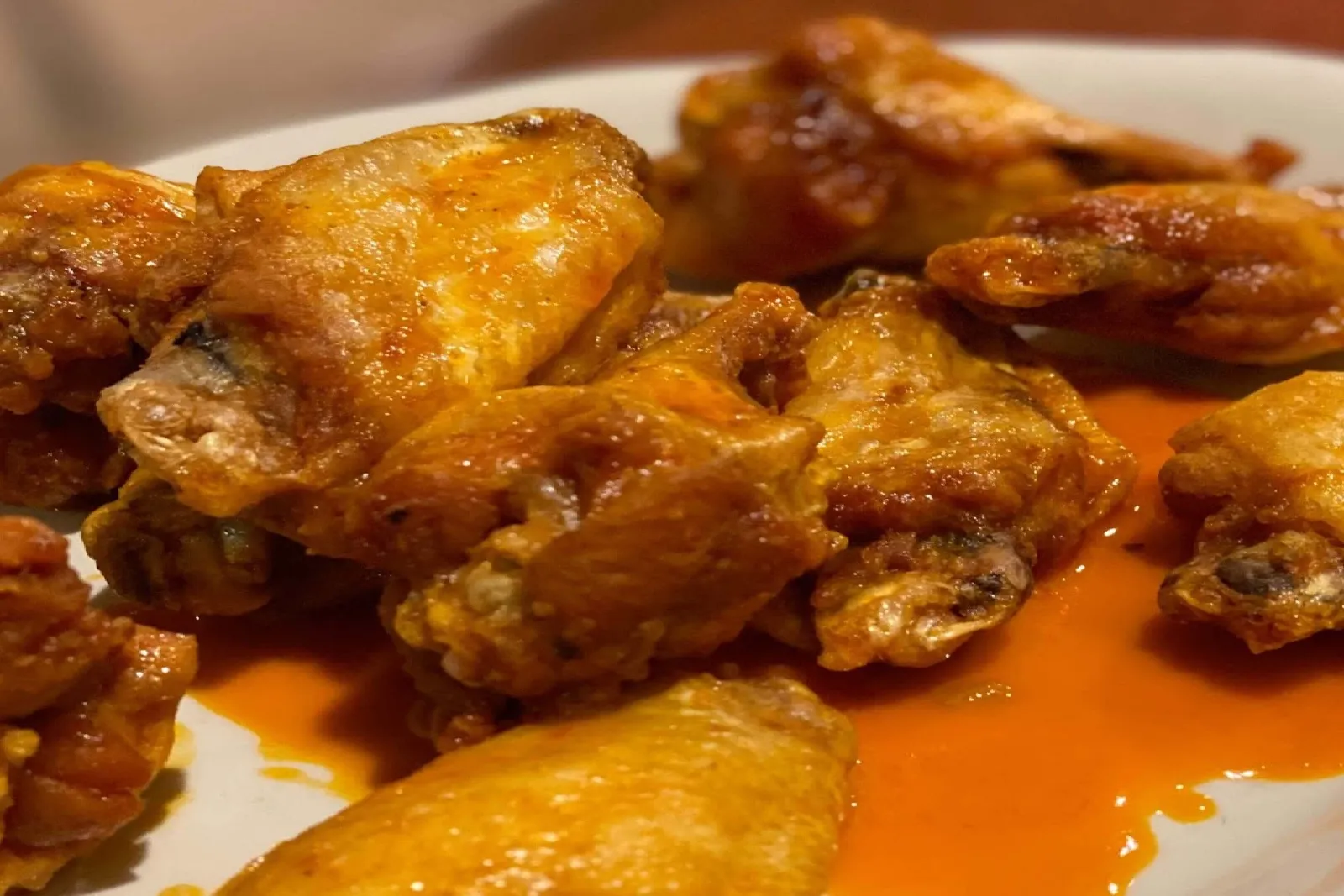 Crispy buffalo wings in spicy sauce