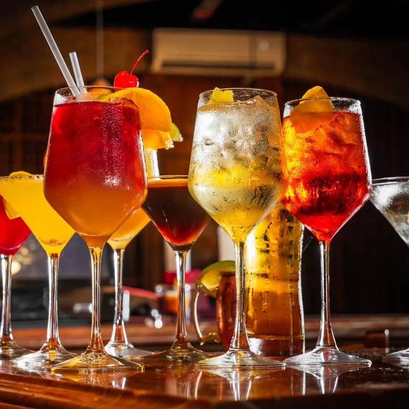 Various drinks on the bar counter.