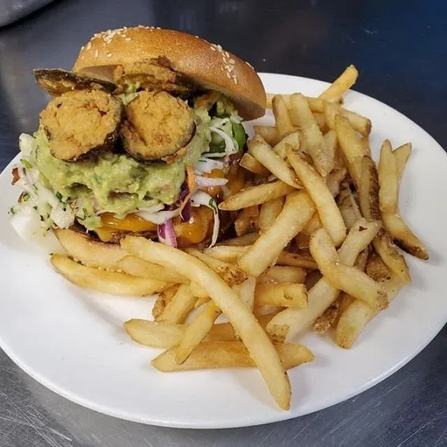 &bull; Thursday Mexican Feature &bull;
Mexican Burger $12 served with Mexican style slaw, cheddar cheese, bacon, fried jalapeños on a sesame bun.