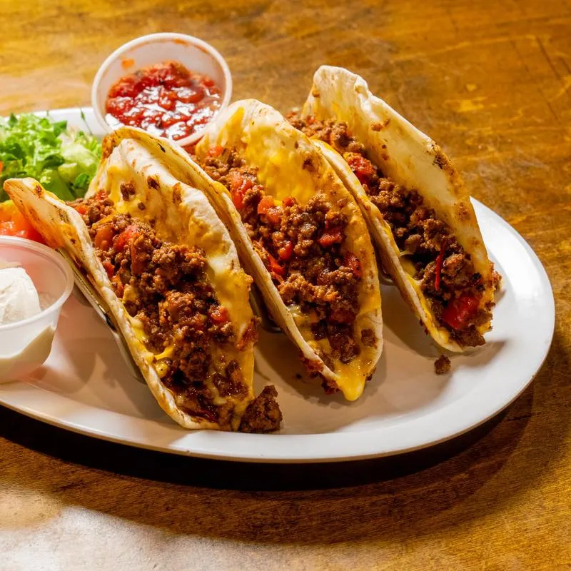 Served tacos on the plate.