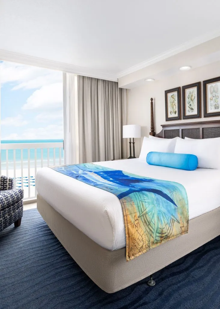 A Bedroom With A Large Bed