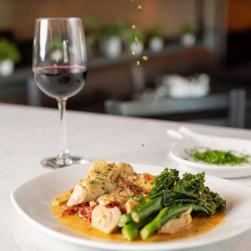 Chicken Marsala and a glass of red wine.
