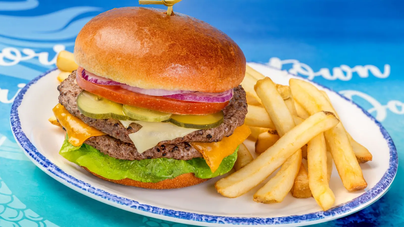 A Burger And Fries On A Plate