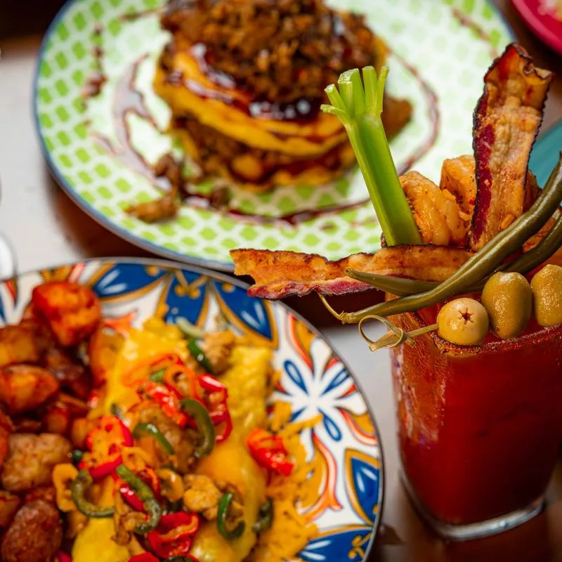Breakfast dishes and a Bloody Mary cocktail.