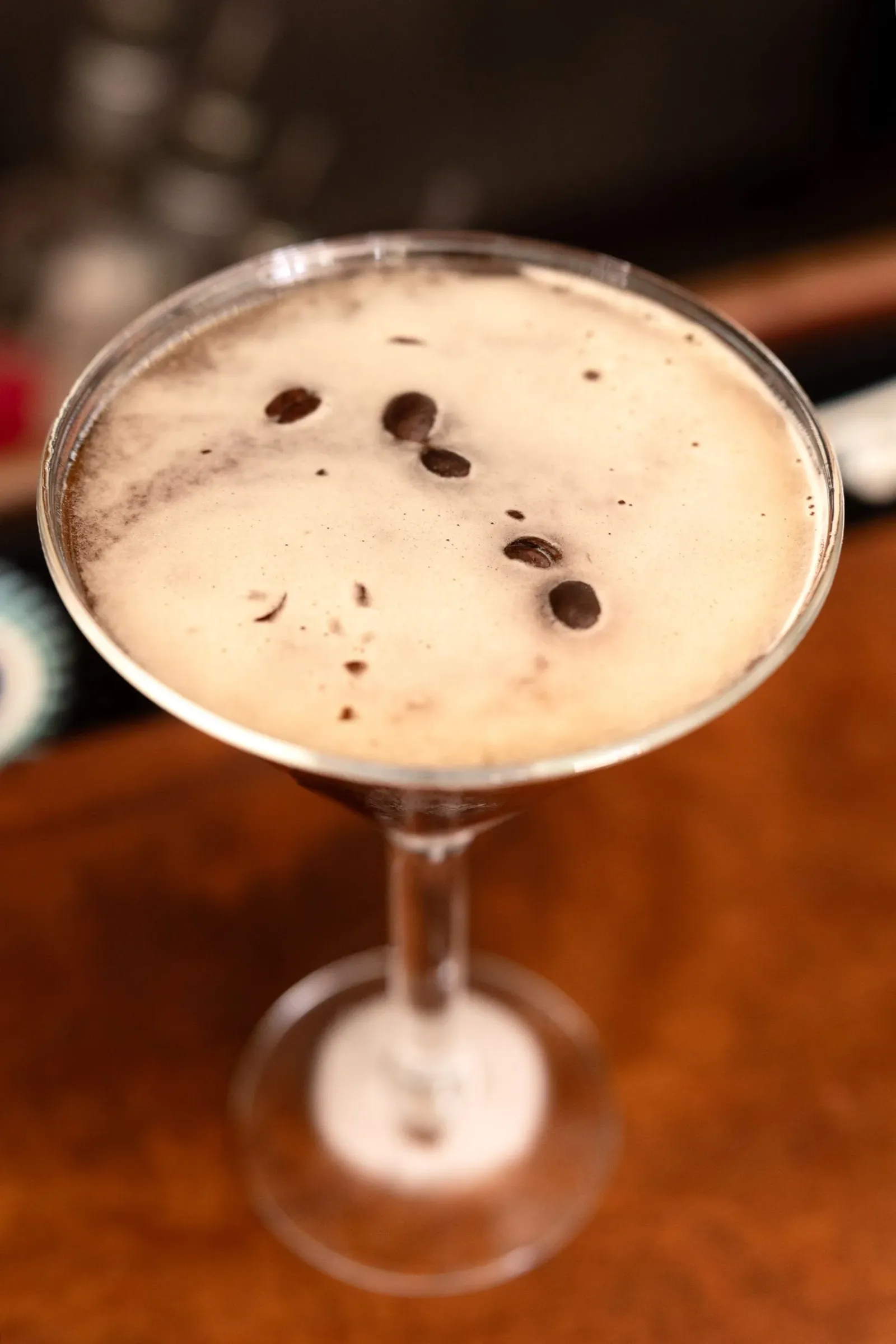 espresso martini with coffee beans on top